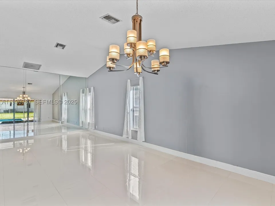 f5c6087342d8c2672022ea87429e46e9l-m2344017989rd-w960_h720 Coral Springs House