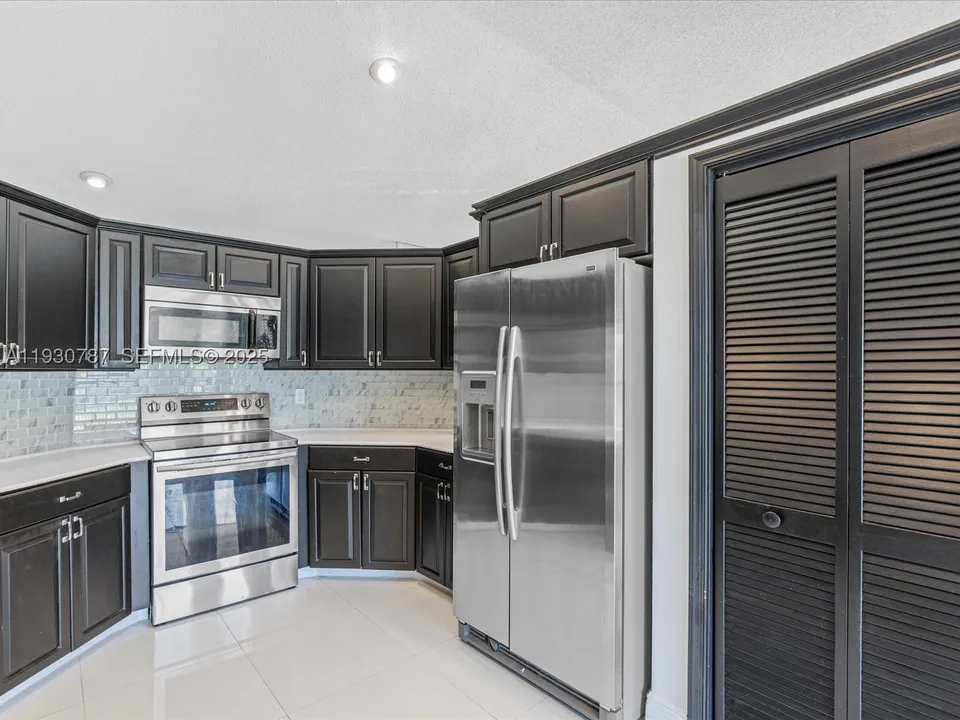 f5c6087342d8c2672022ea87429e46e9l-m3067683477rd-w960_h720 Coral Springs House