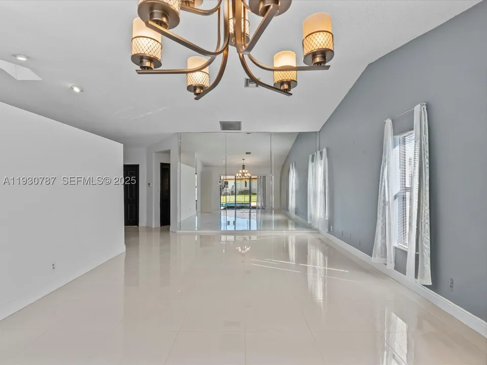 f5c6087342d8c2672022ea87429e46e9l-m3414576951rd-w960_h720 Coral Springs House